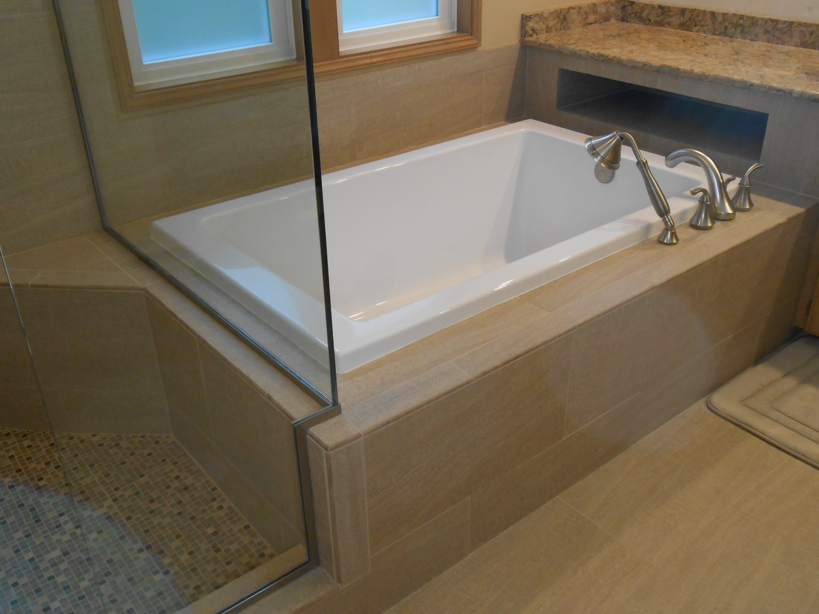 bathtub and tile deck